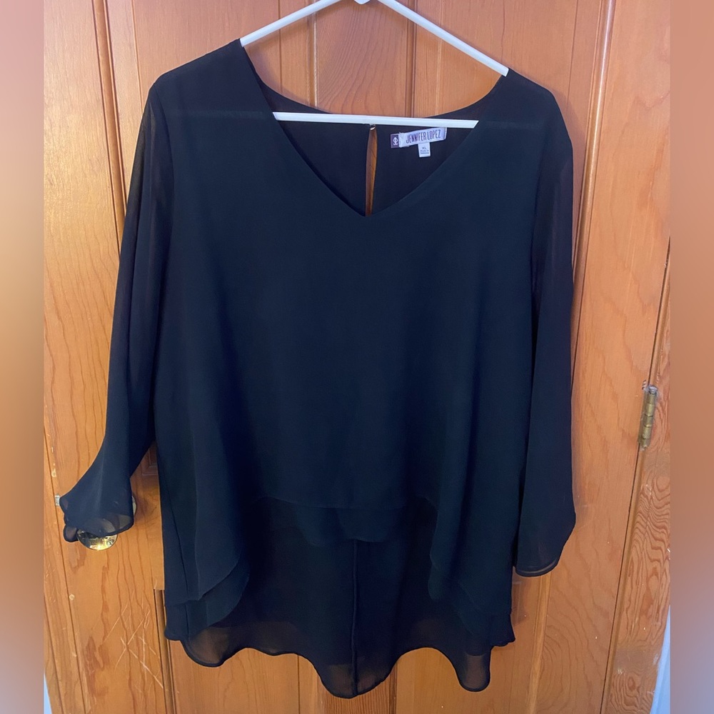 Jennifer Lopez semi sheer black blouse